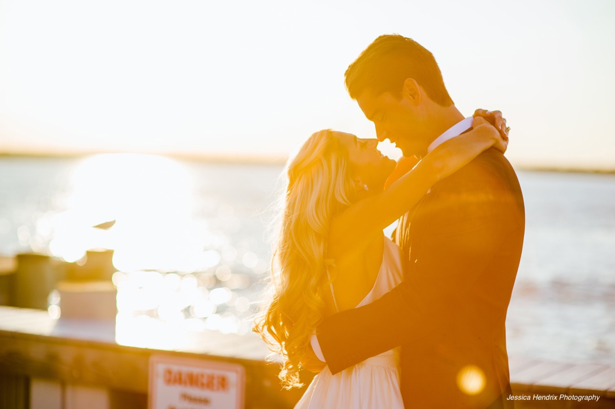 Romantic-couple-embrace-at-sunset-WEDDING-&-EVENTS-Outside-Sunset-Avalon-Yacht-Club